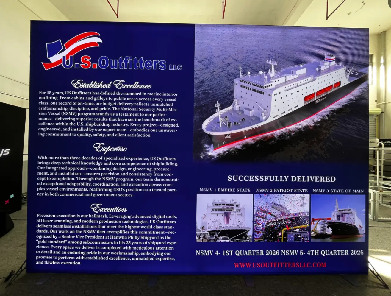 Massive 10ft LED backlit display wall featuring a high-resolution cruise ship graphic for US Outfitters' booth.